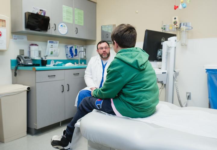 Tween Patient with provider in GI
