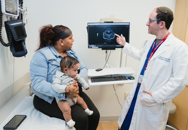 Patient and mom with David Hersh, MD, pediatric neurosurgeon