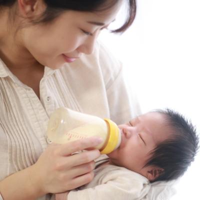 Mother feeding her baby