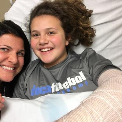 Arianna and Mom, right after wrist surgery at Connecticut Children’s