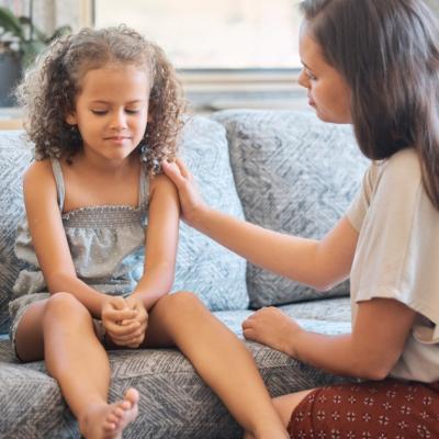 A mother talks to her daughter