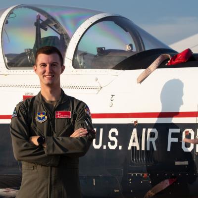 First Lieutenant John Kostal stands (and flies!) proud as a United States Air Force officer.