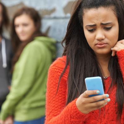 Young adult looking at their phone