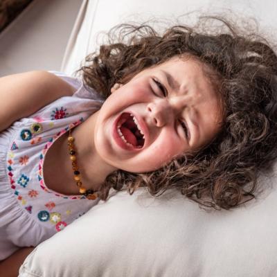 Child screaming in bed