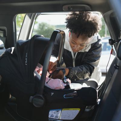 Car Seat Technician Installing a Car Seat