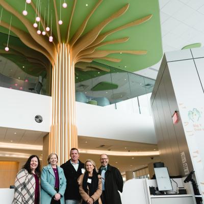 Big Y Philanthropy Committee in Connecticut Children's Lobby, in front of Tree of Life