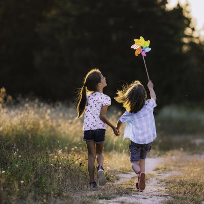 Two girls playing outside