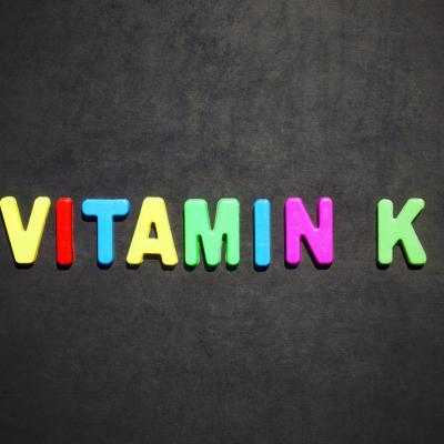 Vitamin K written in colored letters Vitamin K written in colored letters