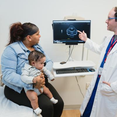 Patient and mom with David Hersh, MD, pediatric neurosurgeon