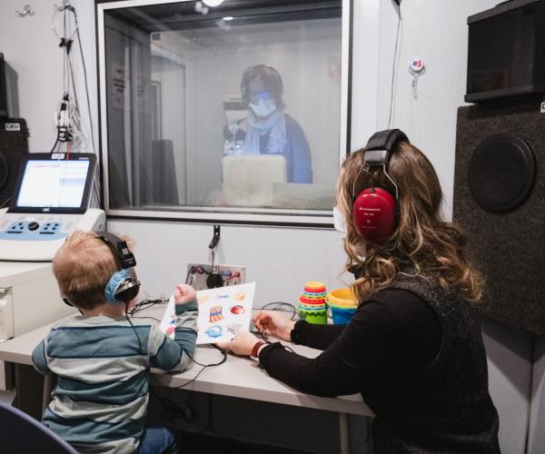 Child receiving a hearing test.