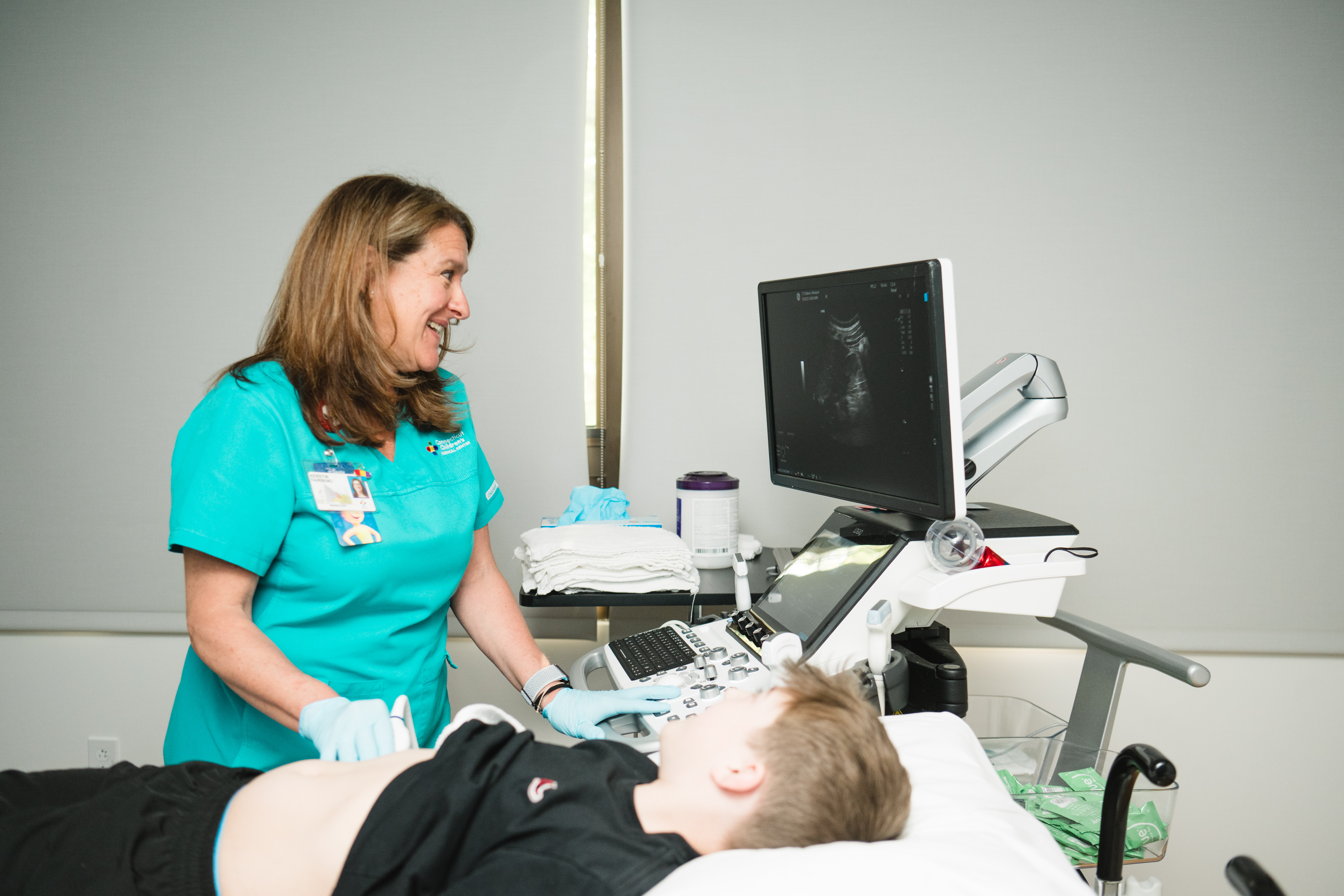 A patient receives an ultrasound on his stomach at the Westport Specialty Center. A patient receives an ultrasound on his stomach at the Westport Specialty Center.