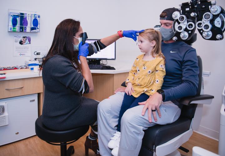 Patient with provider in Ophthalmology Department Patient with provider in Ophthalmology Department