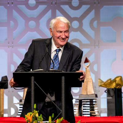 Tom Golisano, philanthrope, at podium